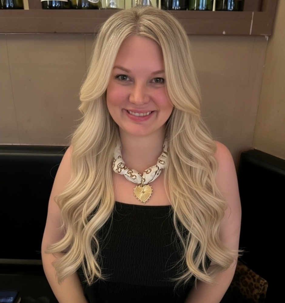Client after: natural blonde lengthened and styled with Dream Hair extensions